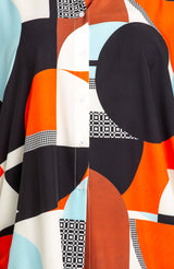 Buxom Couture Curvy Women Plus Size Geometric Print Flowy Hi lo Blouse Multi Orange